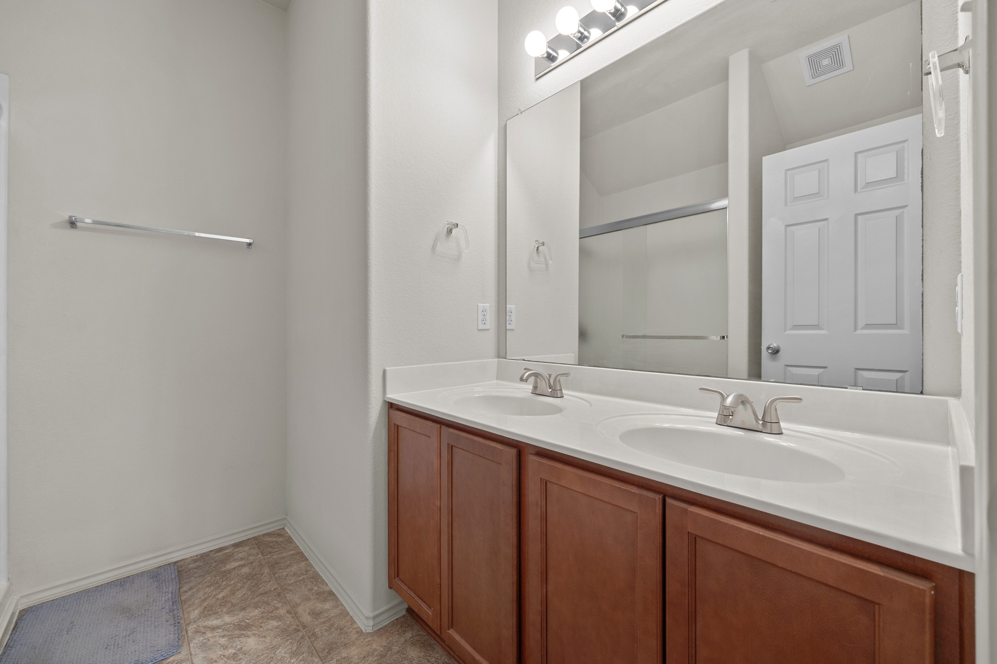 621 Amber Lane Jarrell, TX 76537 - Photo 15 of 22 a bathroom with a sink and a mirror