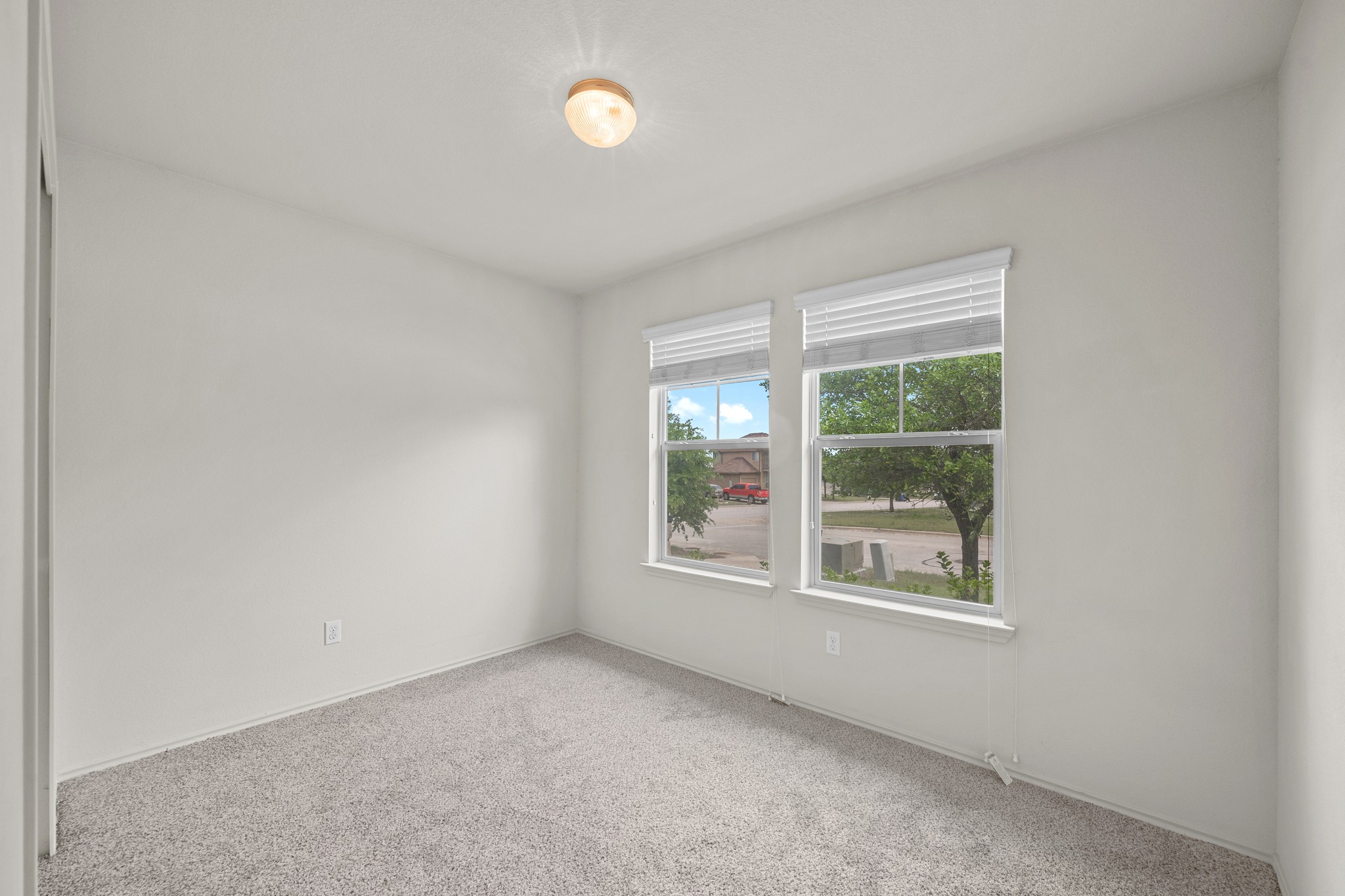 621 Amber Lane Jarrell, TX 76537 - Photo 17 of 22 an empty room with windows