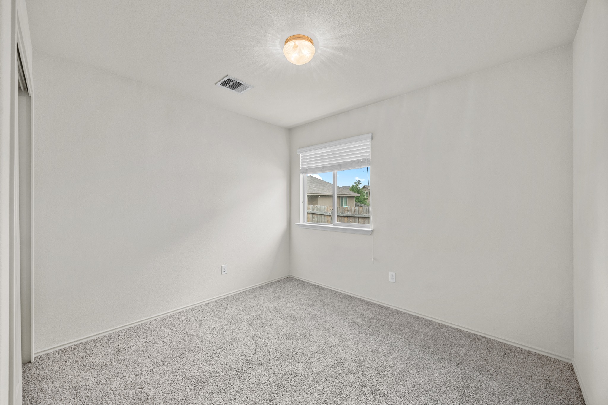 621 Amber Lane Jarrell, TX 76537 - Photo 19 of 22 an empty room with a window