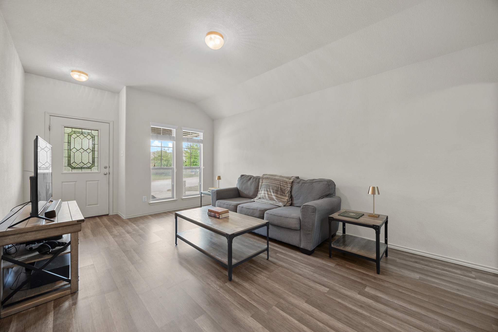 621 Amber Lane Jarrell, TX 76537 - Photo 6 of 22 a living room with furniture and a wooden floor