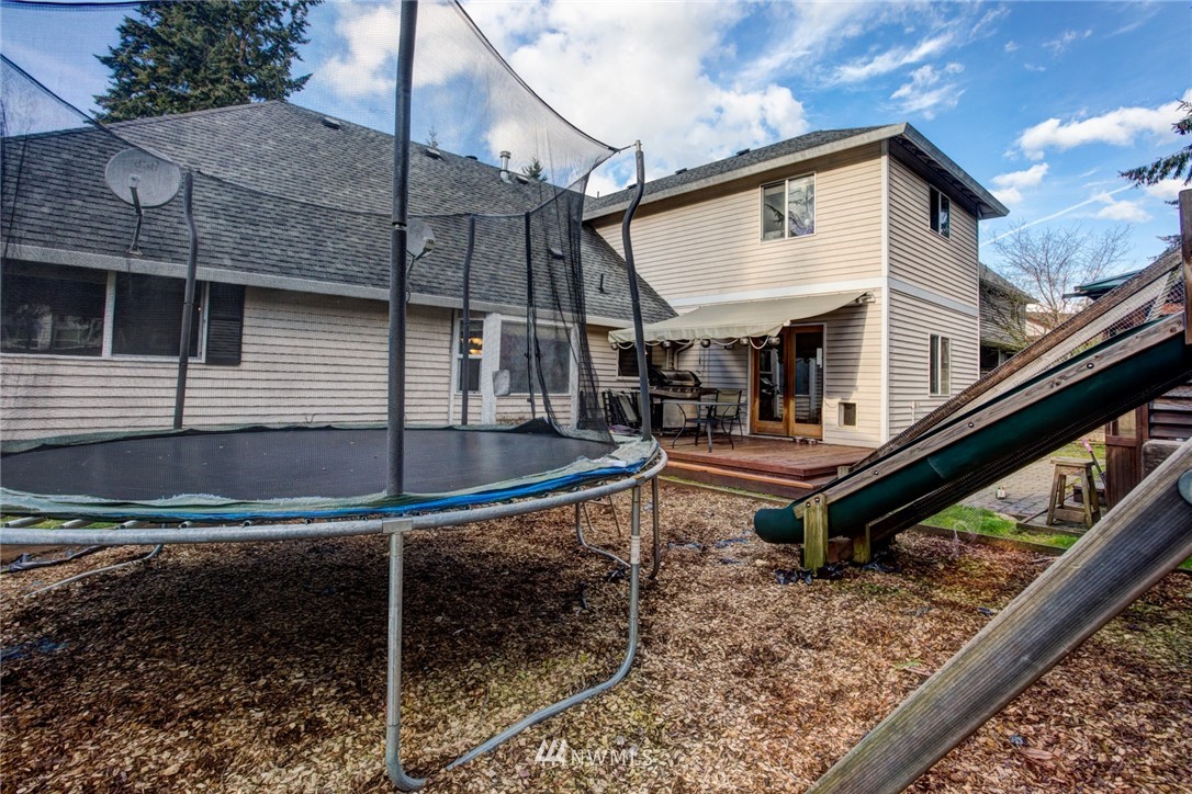 2510 166th Place Southeast Bothell, WA 98012 - Photo 22 of 24 a view of house with a yard and sitting area