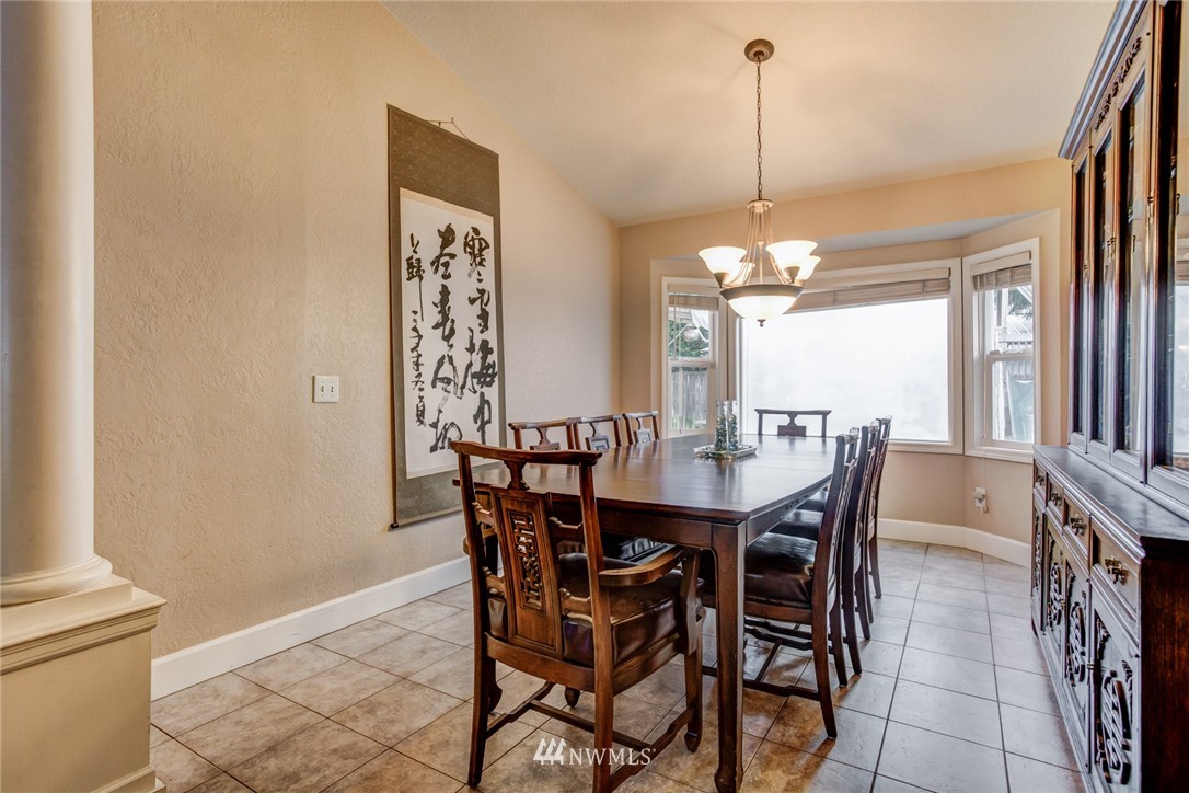 2510 166th Place Southeast Bothell, WA 98012 - Photo 5 of 24 a view of a dining room with furniture and window