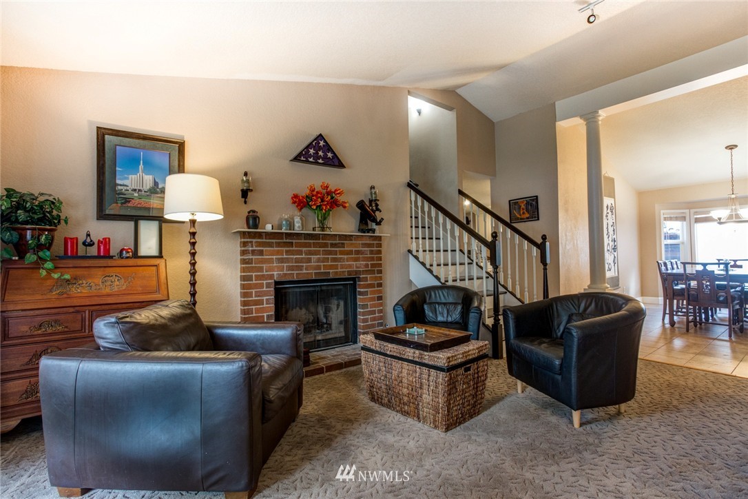 2510 166th Place Southeast Bothell, WA 98012 - Photo 7 of 24 a living room with furniture and a fireplace
