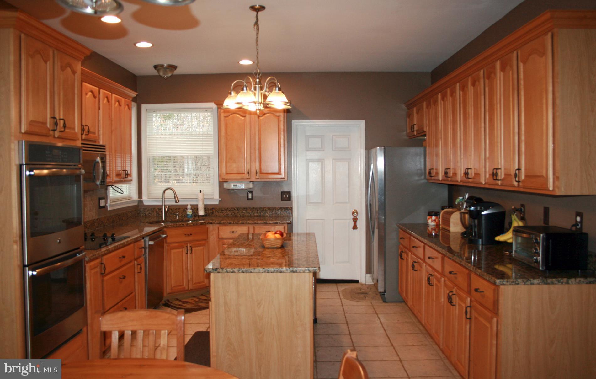 108 Meadows Road Fredericksburg, VA 22406 - Photo 10 of 30 Kitchen w/ new granite, stainless & maple cab.