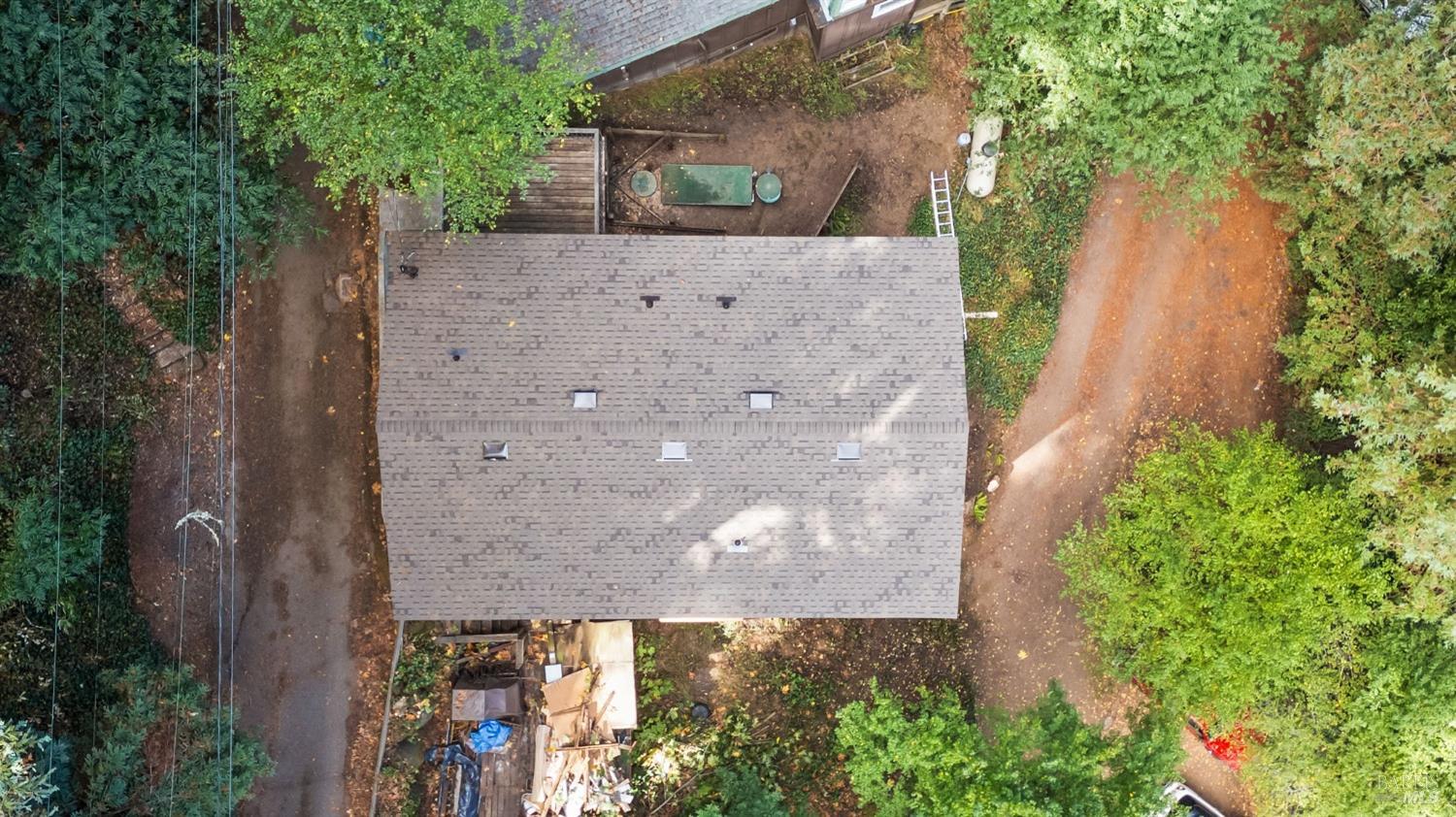 84 Front Street Camp Meeker, CA 95419 - Photo 23 of 24 an aerial view of a house with a yard and tree s