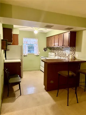 a view of a room with cabinet door