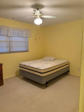 a bathroom with a toilet a sink and a shower