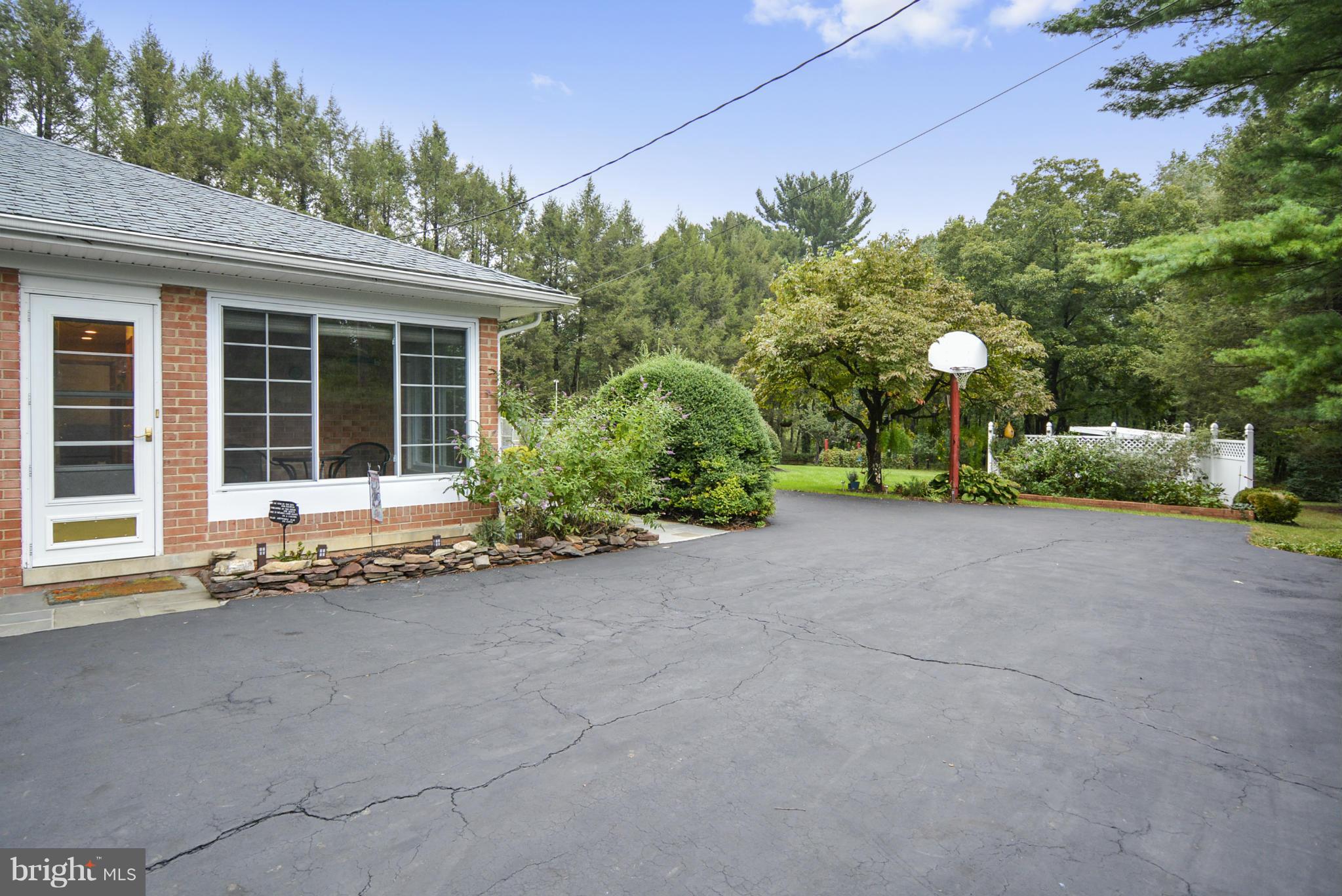 2138 Apple Tree Lane Silver Spring, MD 20905 - Photo 20 of 30 a view of a house with backyard and a garden