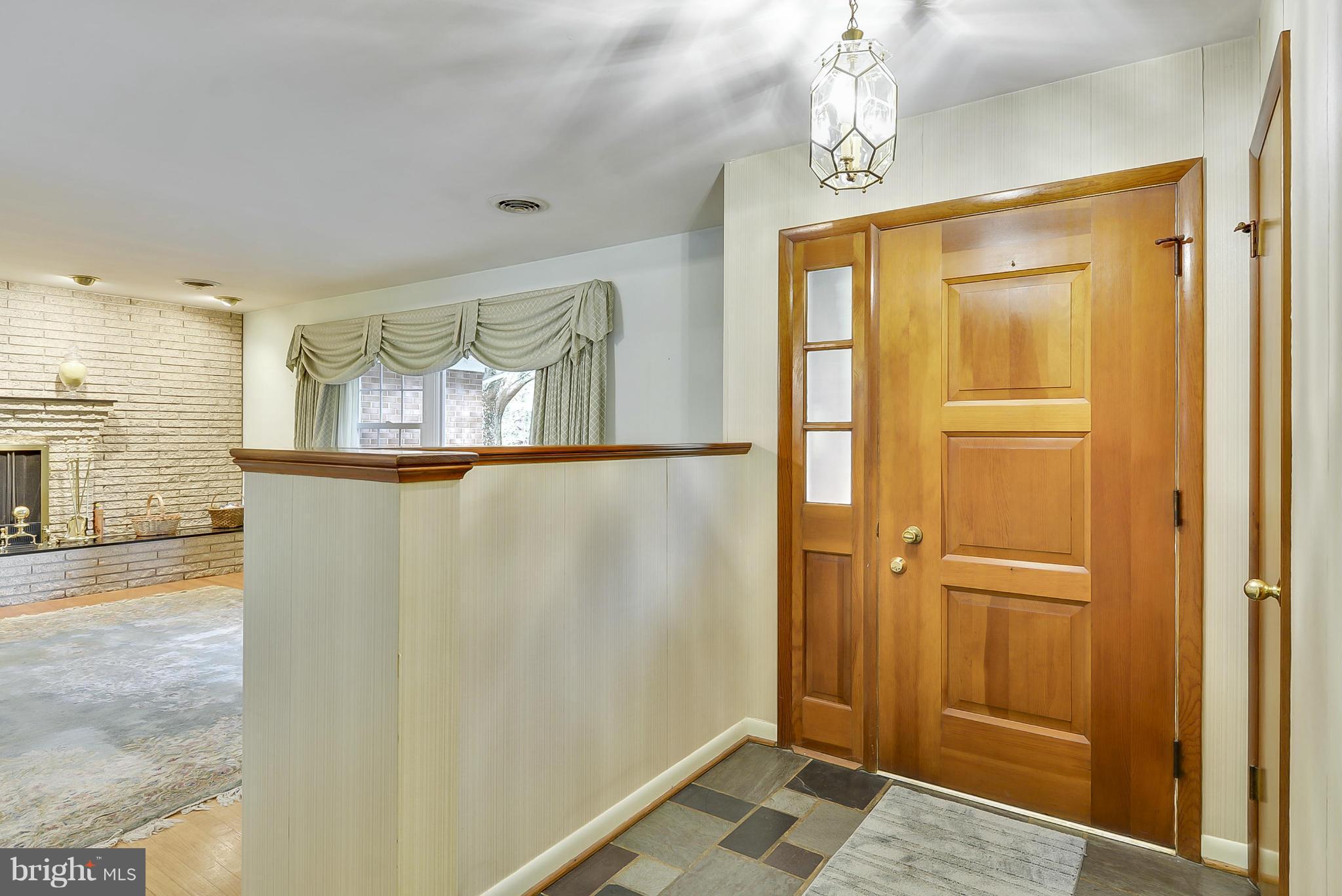2138 Apple Tree Lane Silver Spring, MD 20905 - Photo 3 of 30 a bathroom with a glass shower door and a window