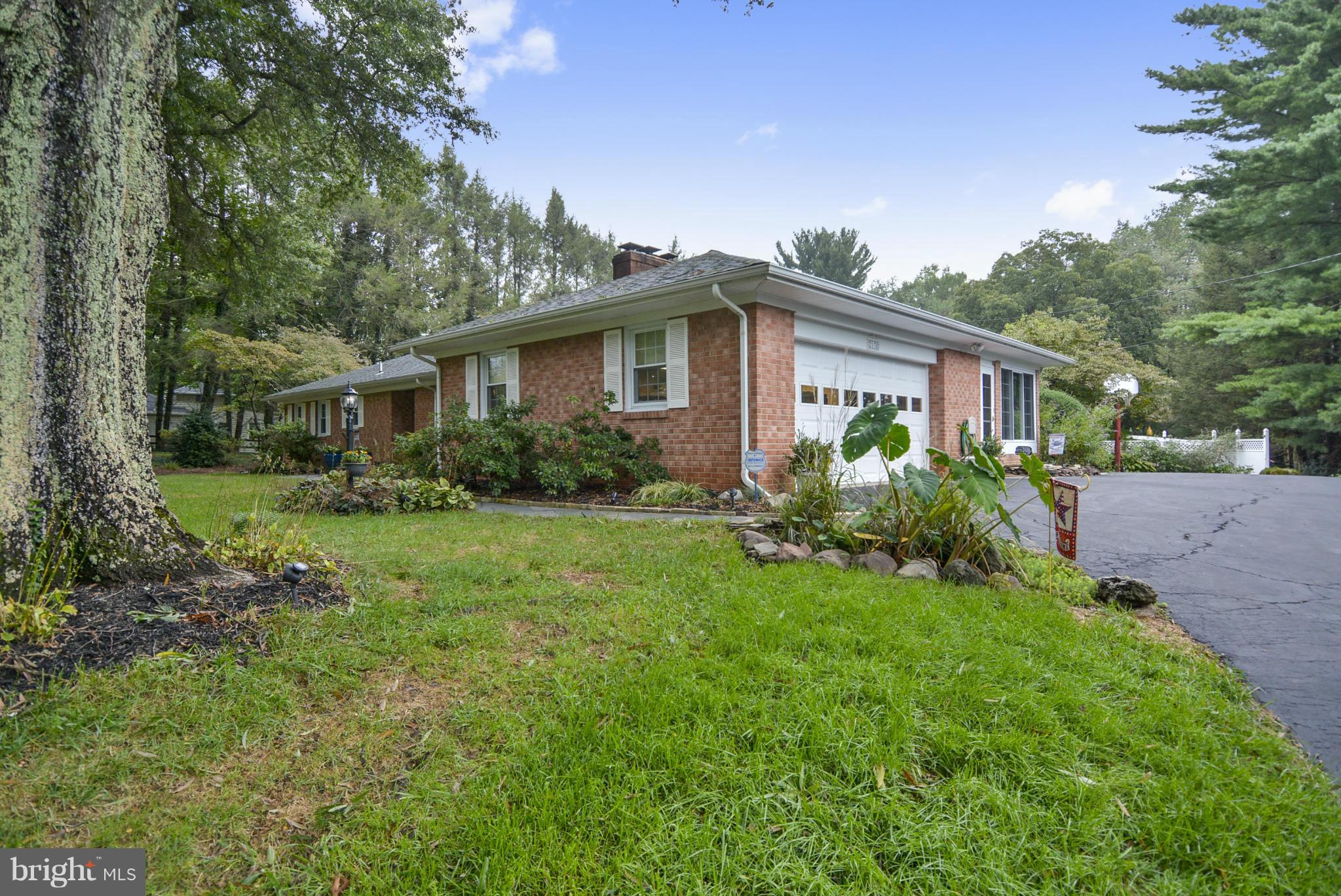 2138 Apple Tree Lane Silver Spring, MD 20905 - Photo 24 of 30 a front view of house with yard and green space