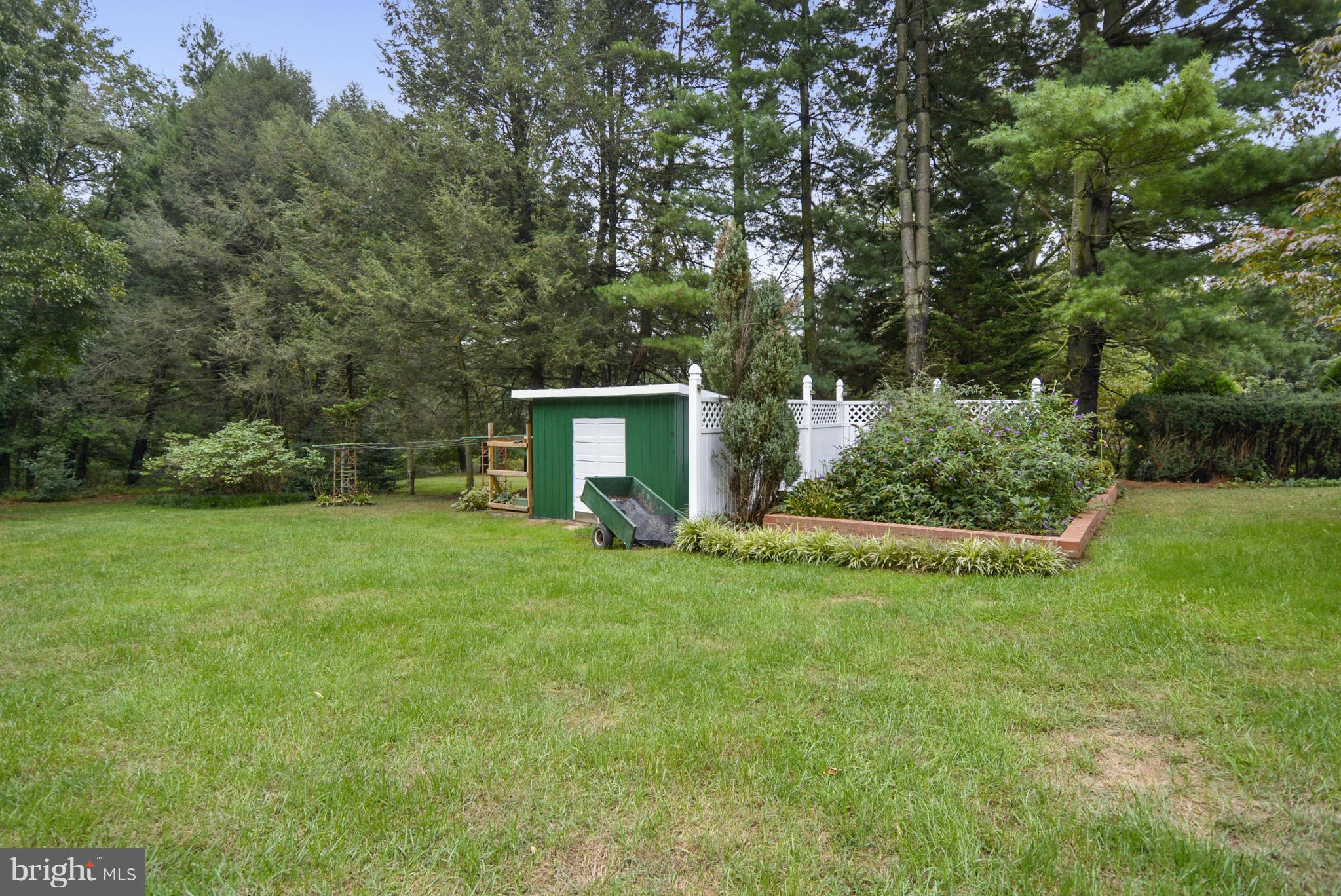 2138 Apple Tree Lane Silver Spring, MD 20905 - Photo 27 of 30 a view of a house with backyard and garden