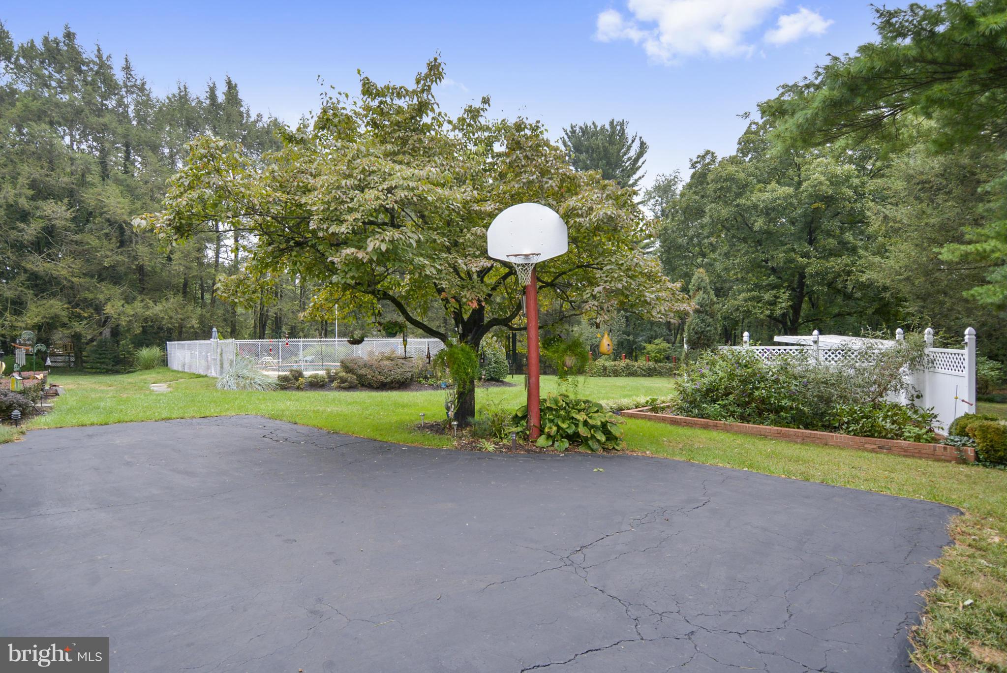 2138 Apple Tree Lane Silver Spring, MD 20905 - Photo 28 of 30 a view of a garden with a slide