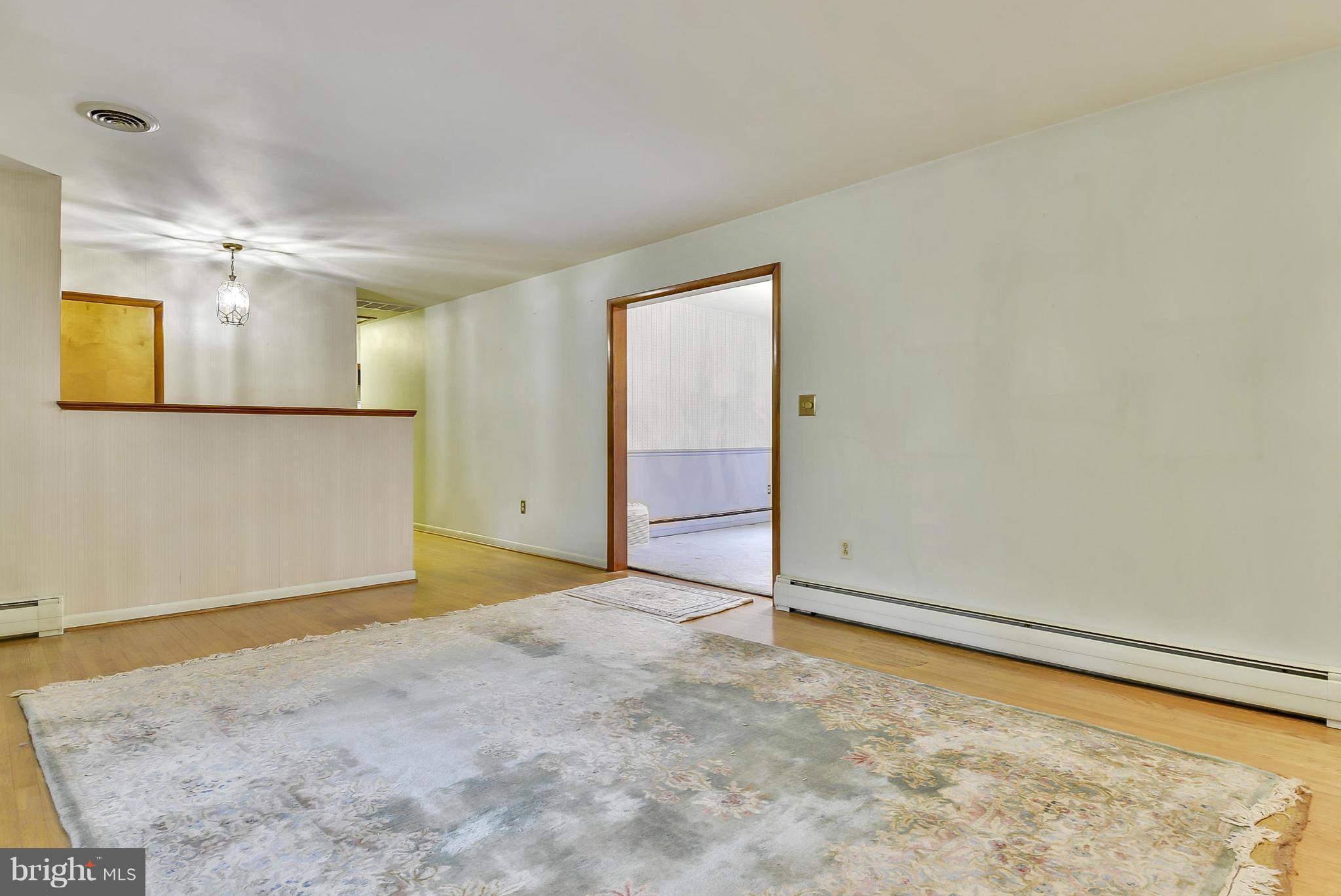2138 Apple Tree Lane Silver Spring, MD 20905 - Photo 5 of 30 an empty room with a empty space and a window