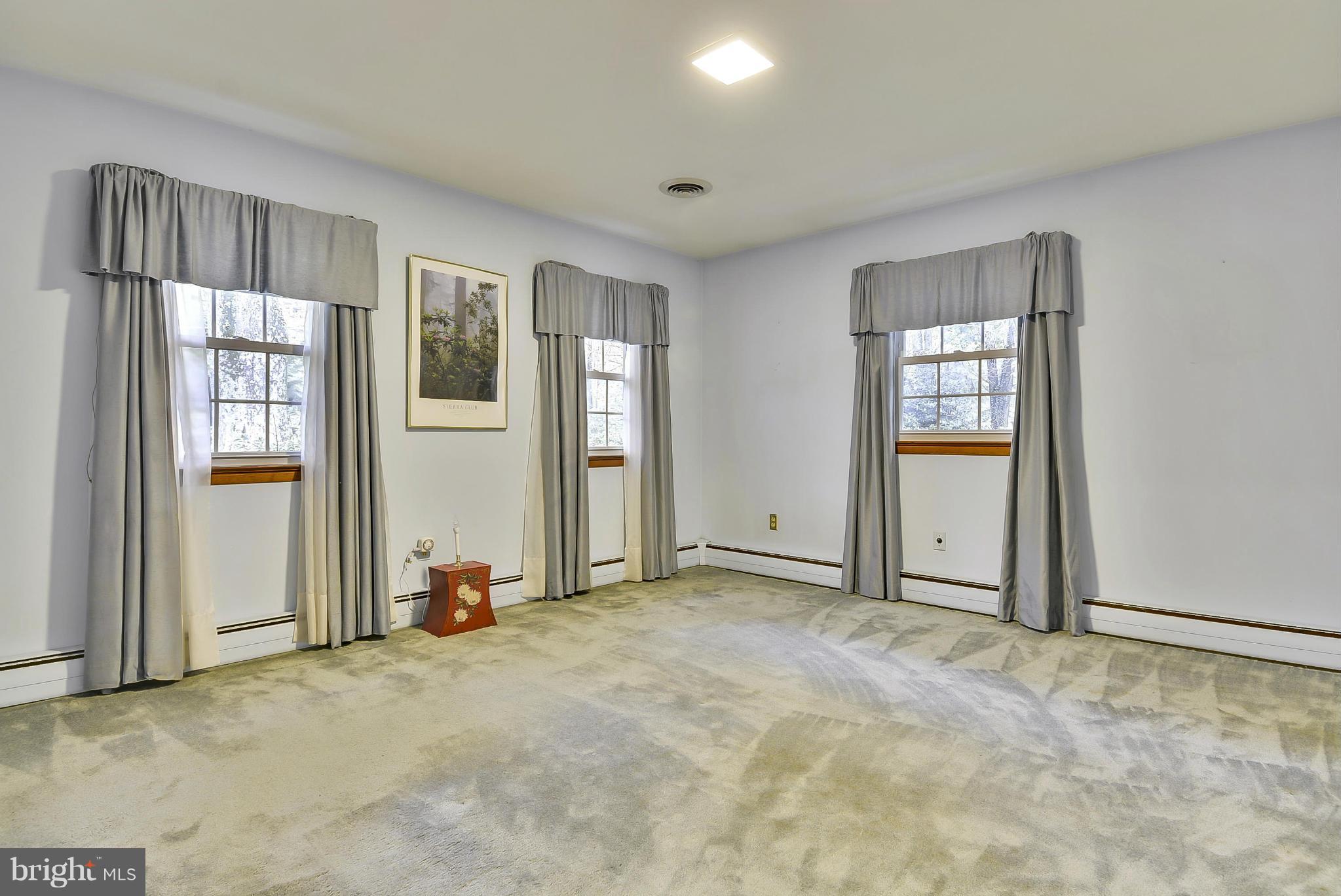 2138 Apple Tree Lane Silver Spring, MD 20905 - Photo 10 of 30 an empty room with windows and closet