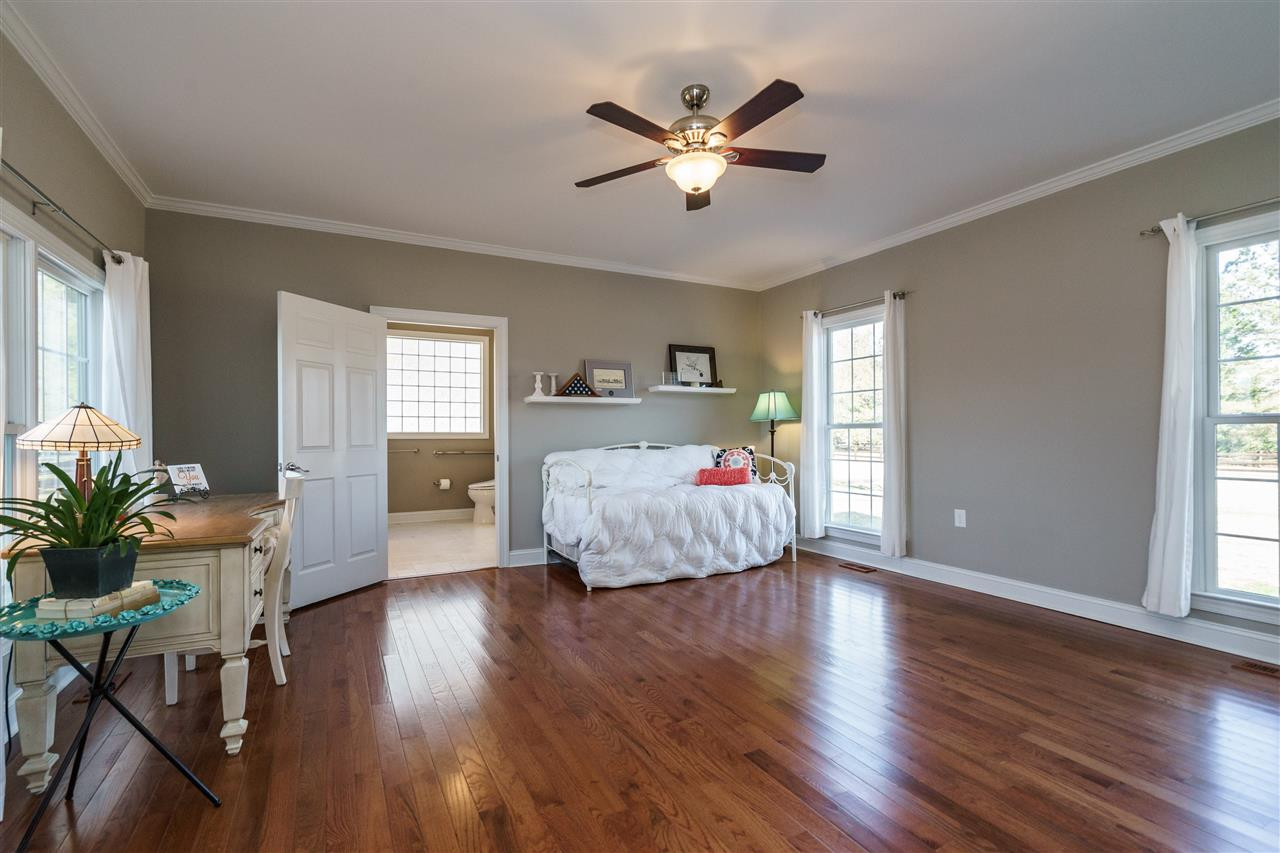 904 Windrow Lane Raleigh, NC 27603 - Photo 10 of 25 Doubles as downstairs master and offers widened doorways, no-step entry, and exterior ramp. Guest Suite