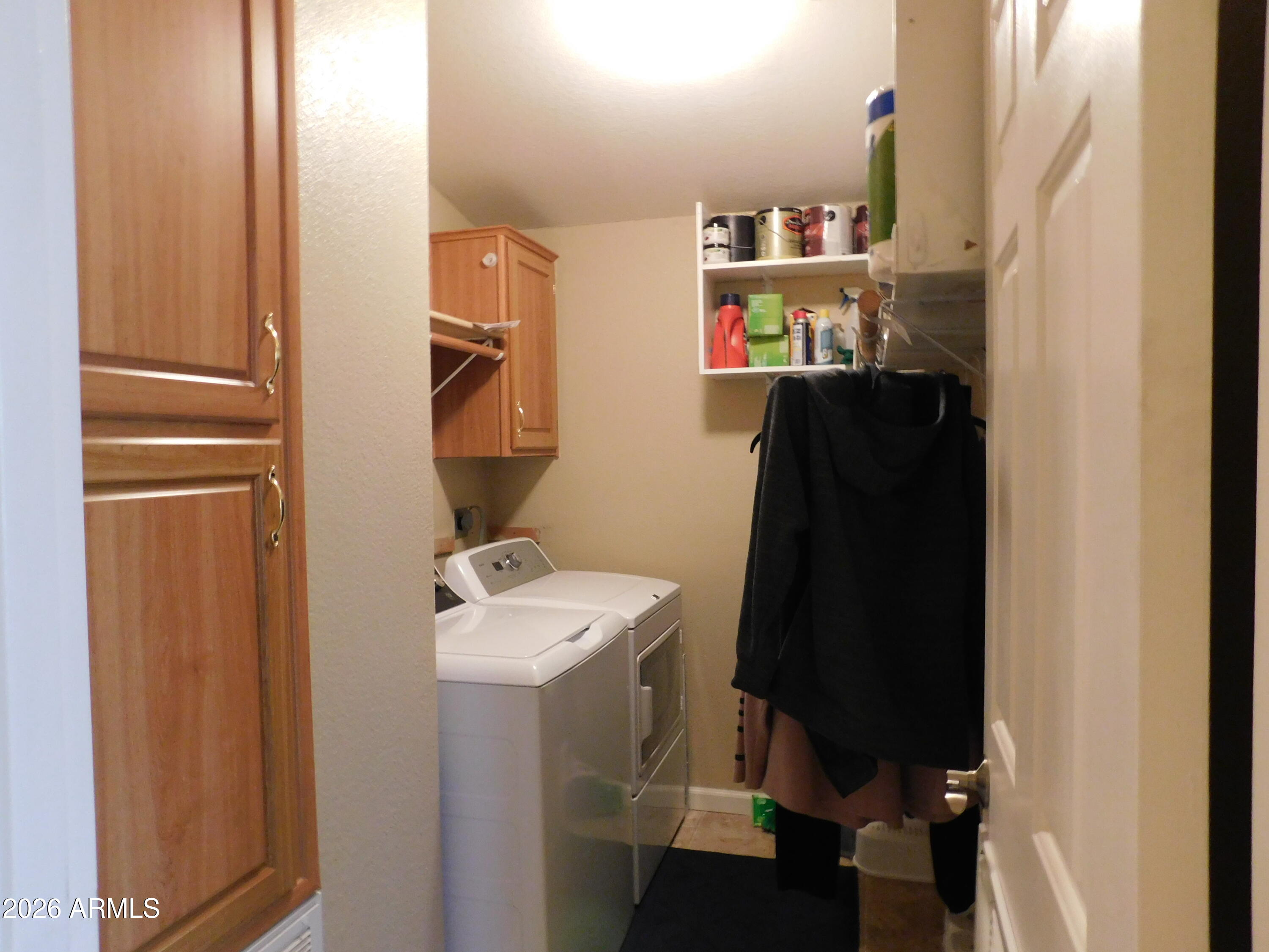 3301 South Goldfield Road, Unit 1054 Apache Junction, AZ 85119 - Photo 21 of 41 a bathroom with a sink mirror and vanity