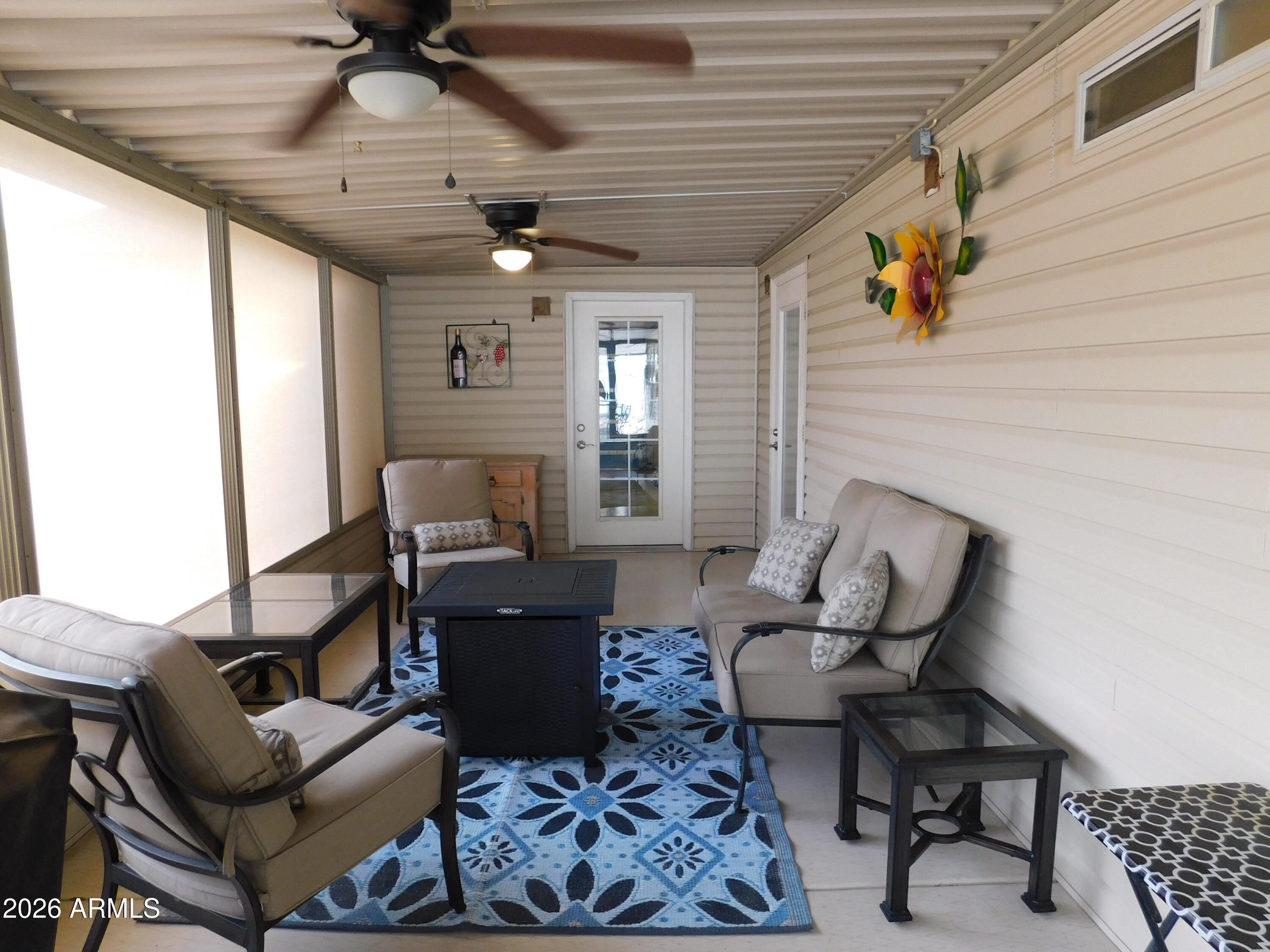 3301 South Goldfield Road, Unit 1054 Apache Junction, AZ 85119 - Photo 32 of 41 a living room with furniture