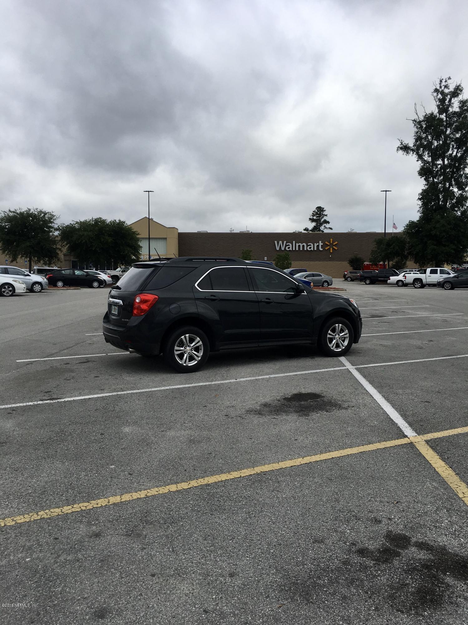 4057 East M Spence Road Macclenny, FL 32063 - Photo 2 of 3 a view of street with parked cars