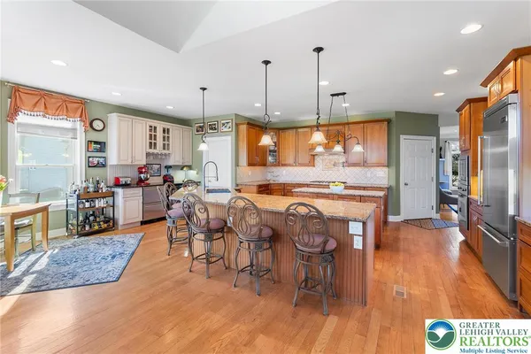 a view of a kitchen and dining room
