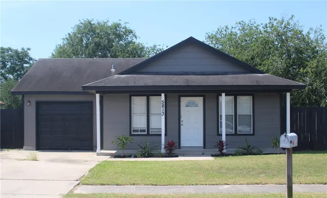 a house view with garden space
