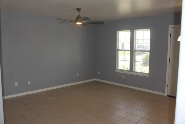 a kitchen with a refrigerator stove and microwave