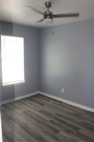 a bathroom with a toilet a sink and bathtub