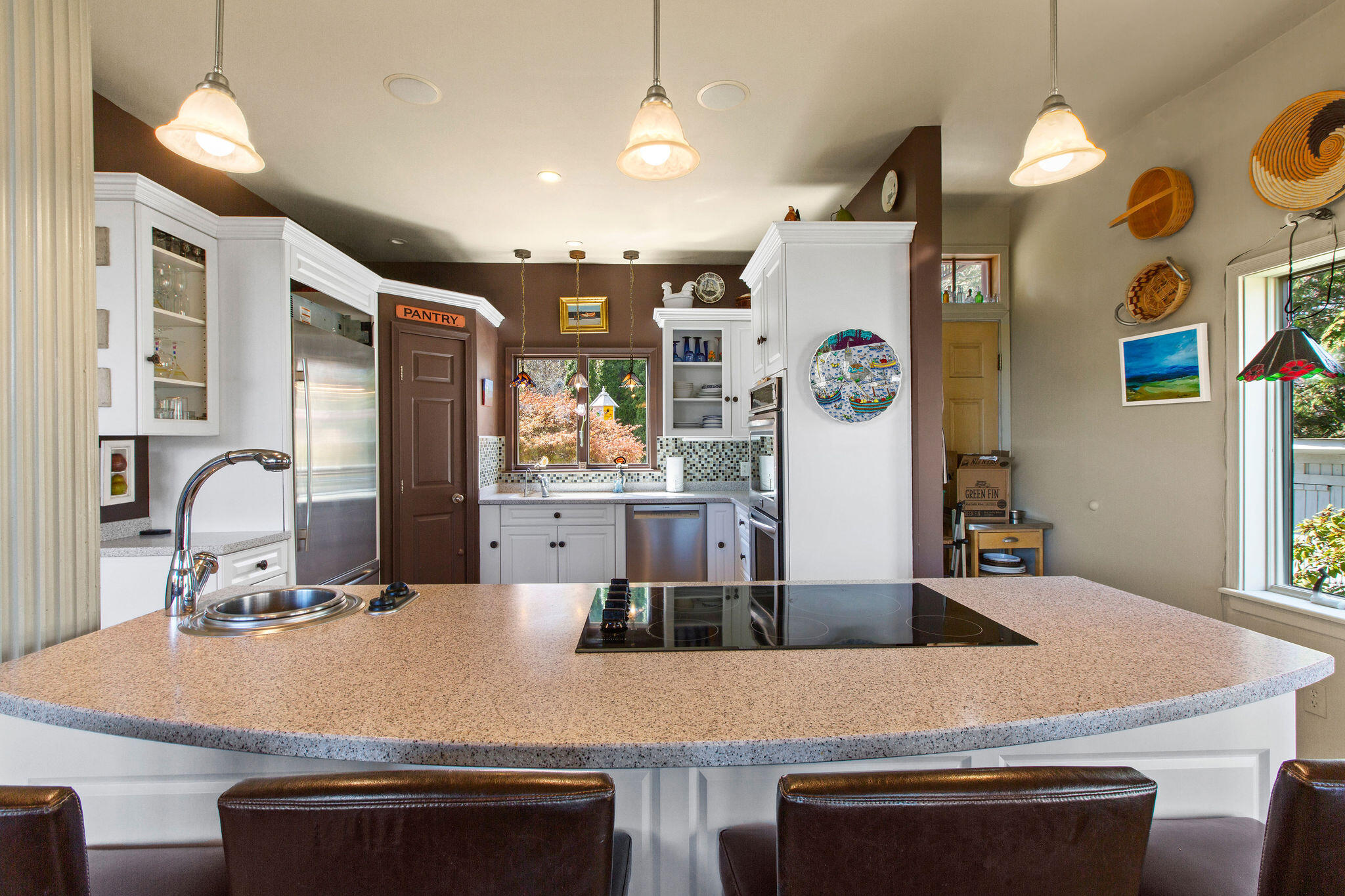 10 Somerset Road Provincetown, MA 02657 - Photo 19 of 50 a kitchen with stainless steel appliances granite countertop a sink and a refrigerator