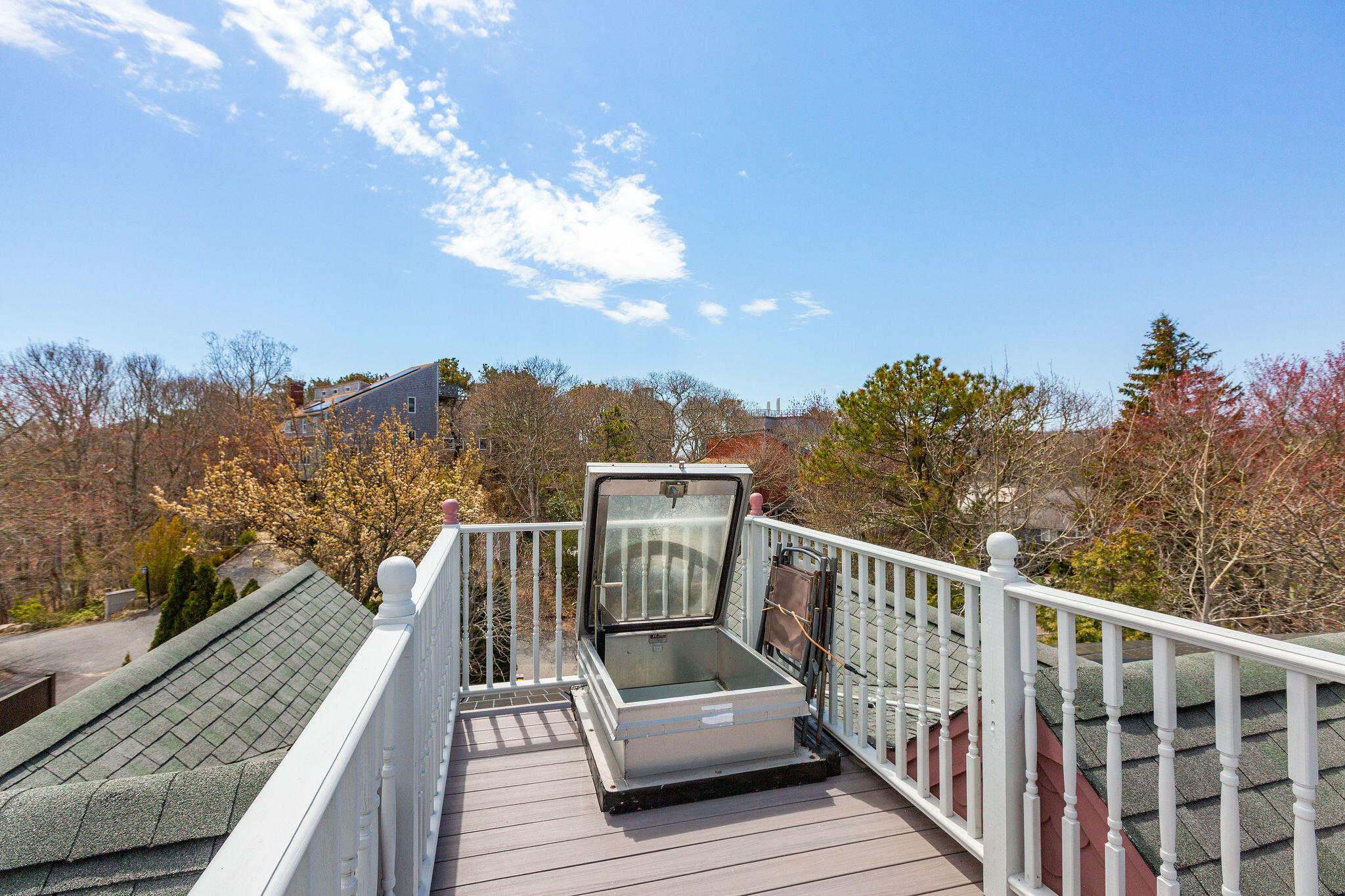 10 Somerset Road Provincetown, MA 02657 - Photo 39 of 50 a view of a roof deck with wooden floor and fence