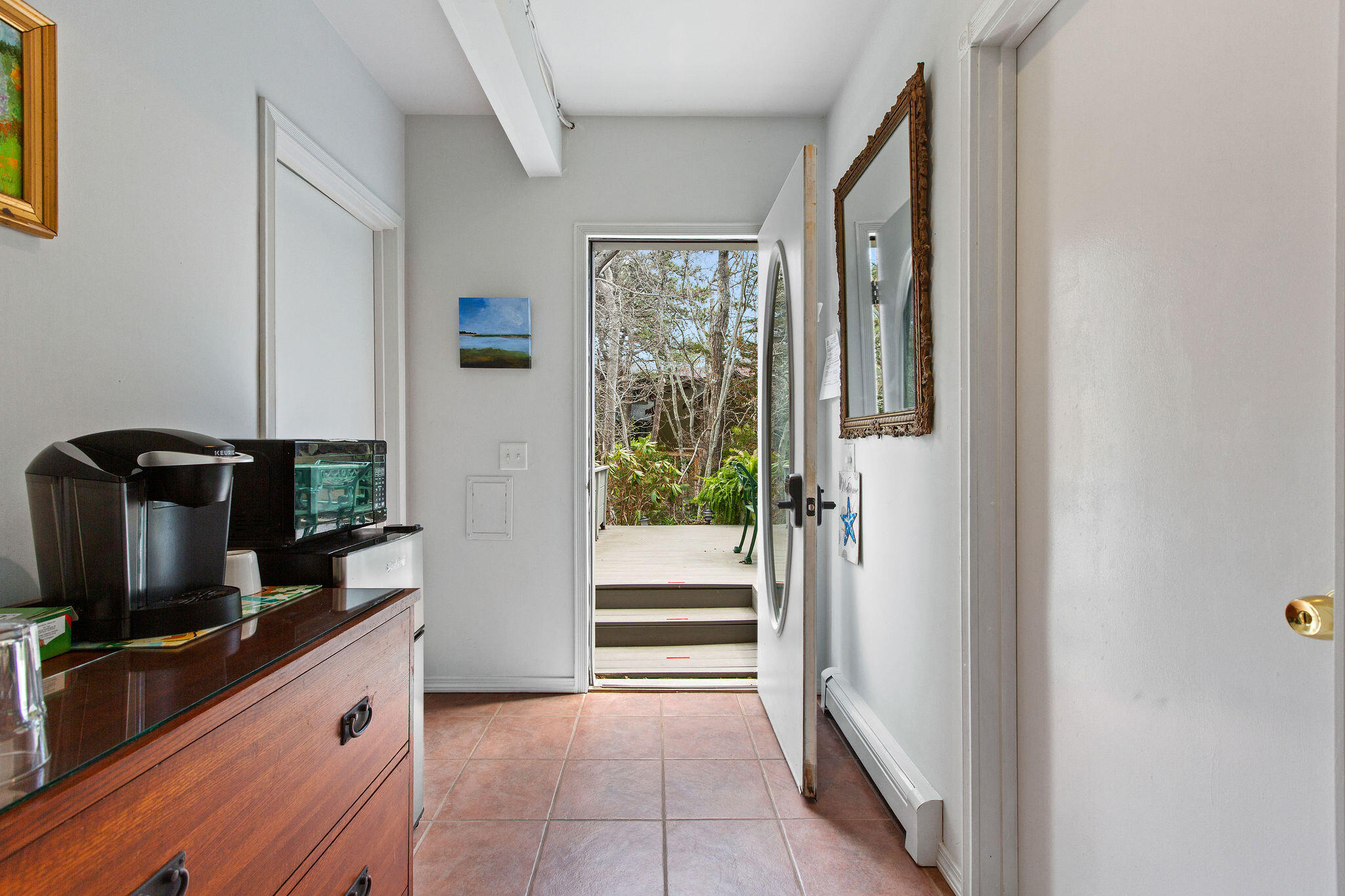 10 Somerset Road Provincetown, MA 02657 - Photo 46 of 50 a kitchen with a refrigerator and microwave