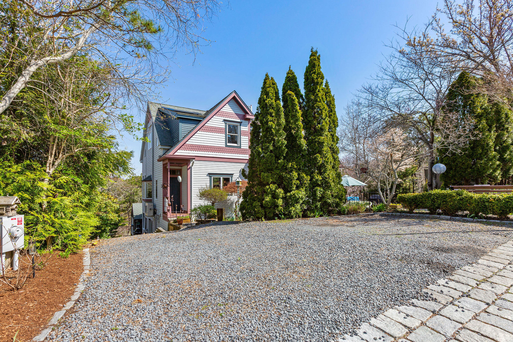 10 Somerset Road Provincetown, MA 02657 - Photo 50 of 50 a view of a house with a yard and potted plants