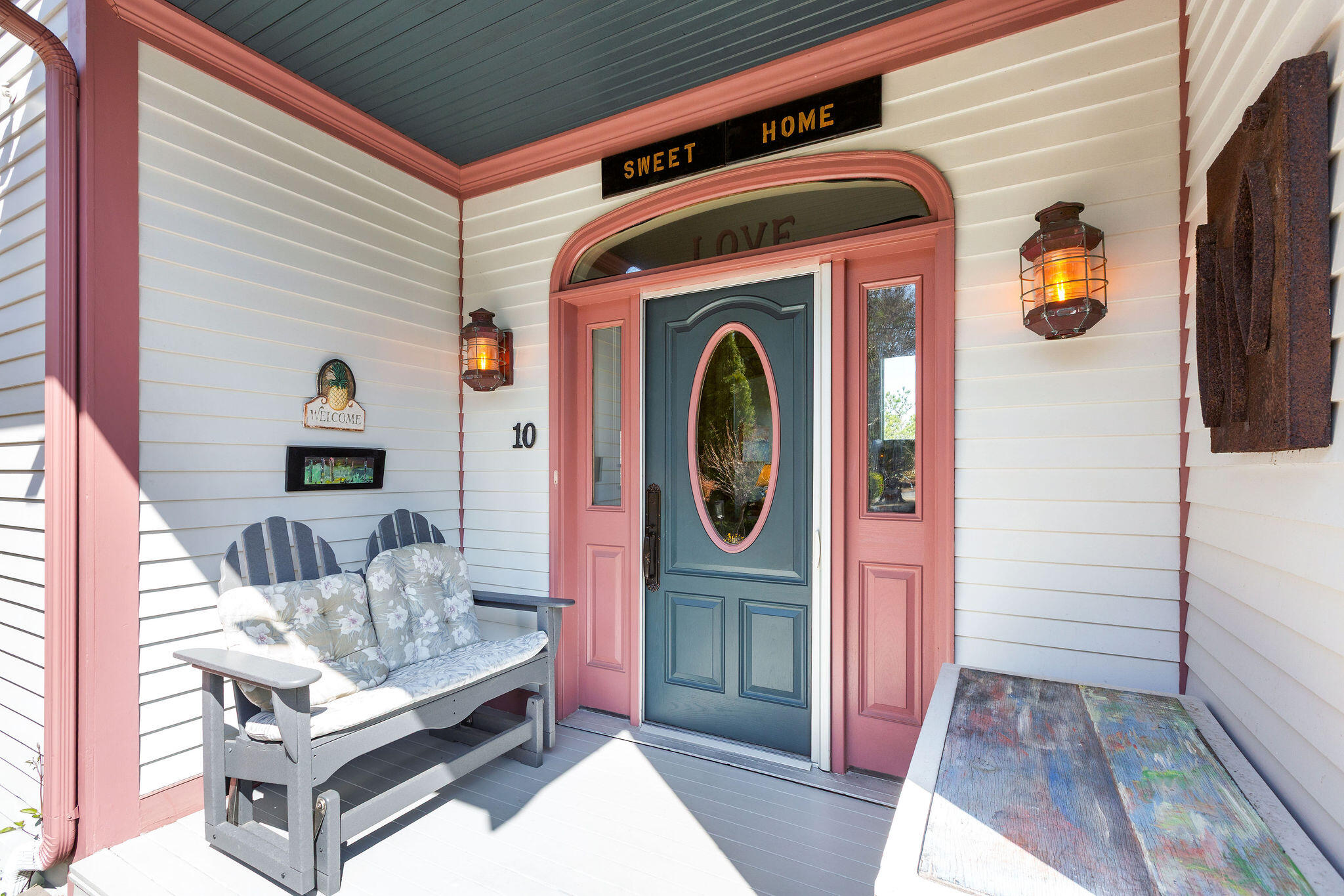 10 Somerset Road Provincetown, MA 02657 - Photo 5 of 50 a front view of a house with entryway and wooden floor