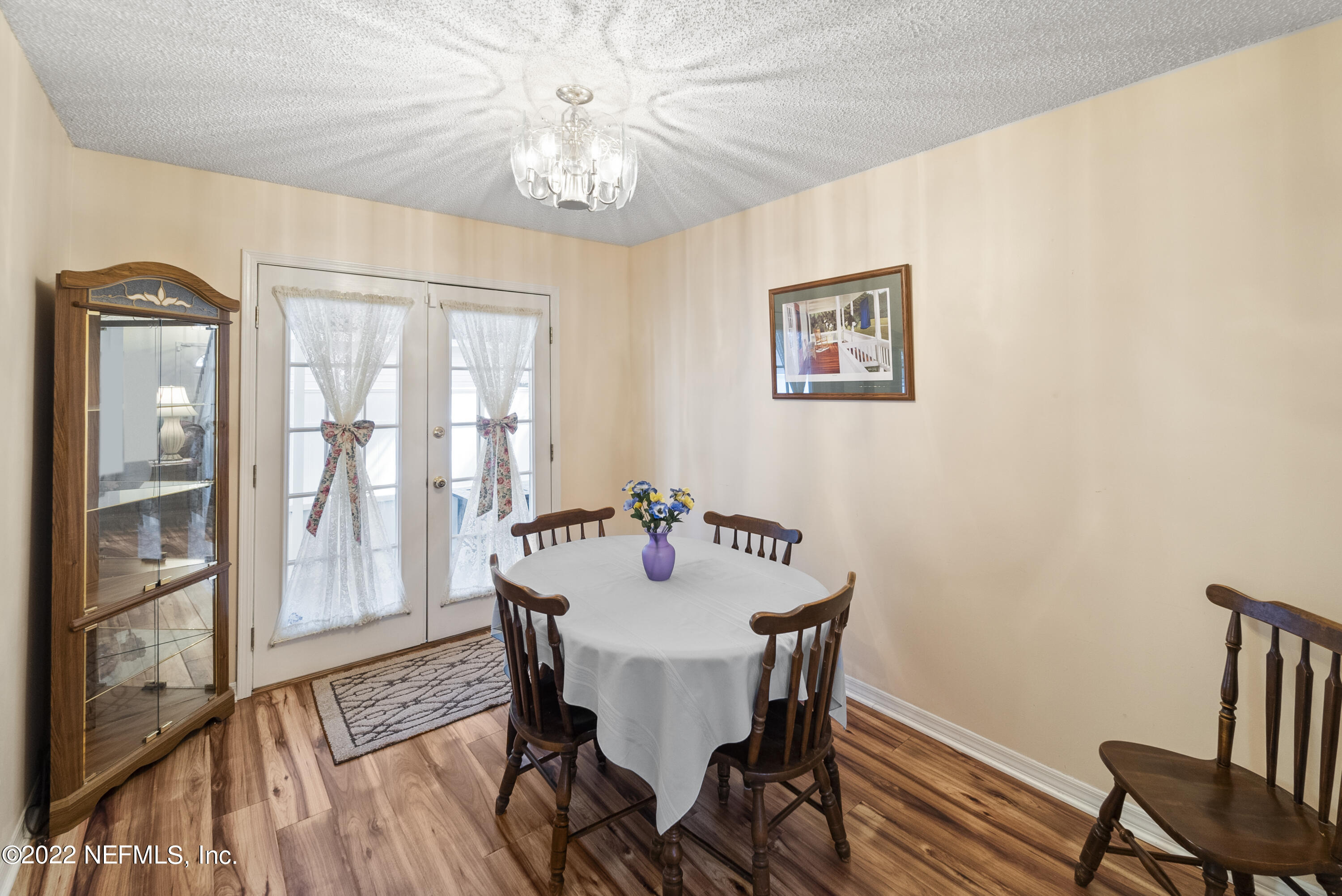 12855 Moose Road Jacksonville, FL 32226 - Photo 18 of 29 a view of a dining room with furniture window and wooden floor