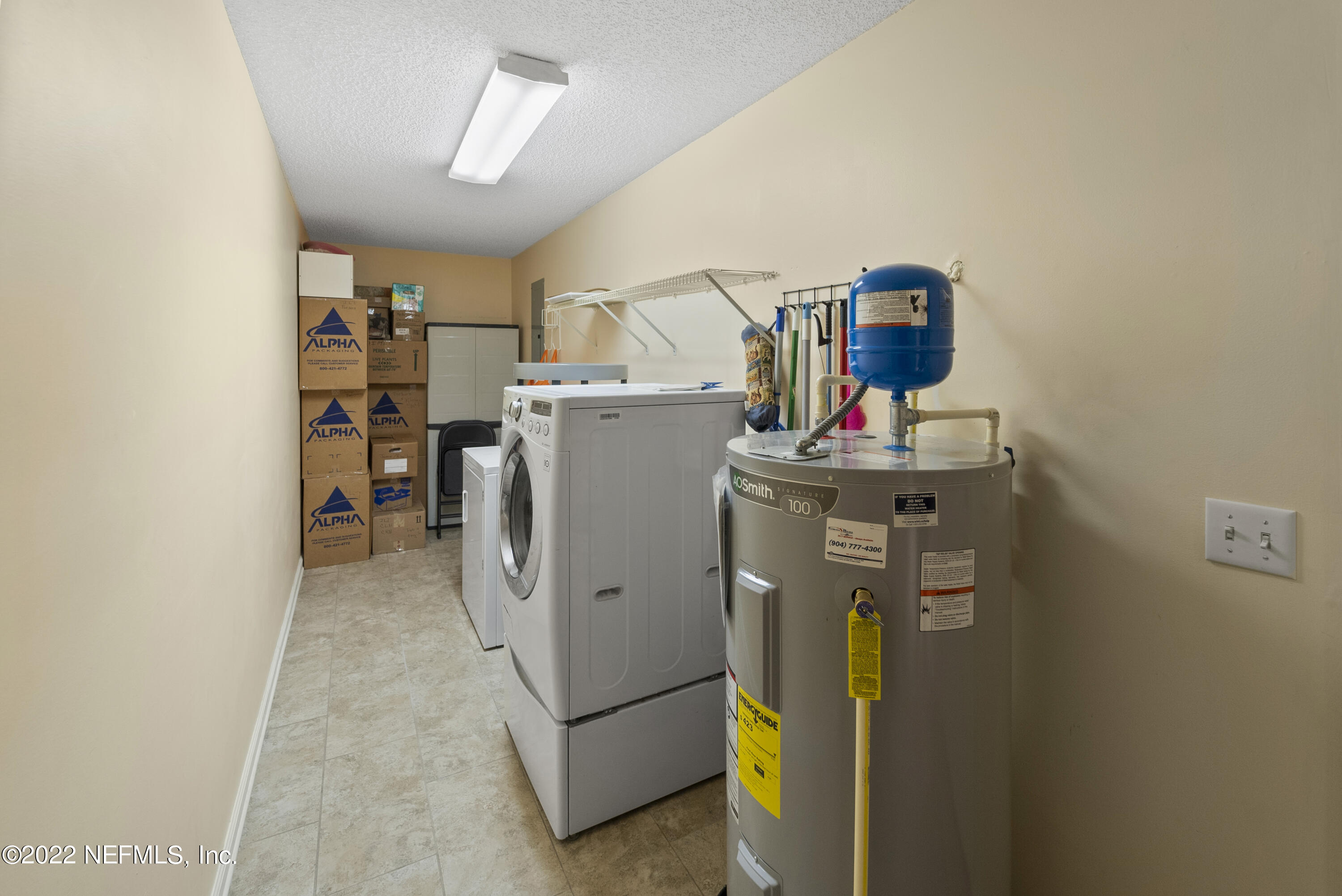 12855 Moose Road Jacksonville, FL 32226 - Photo 19 of 29 a room with storage and utility