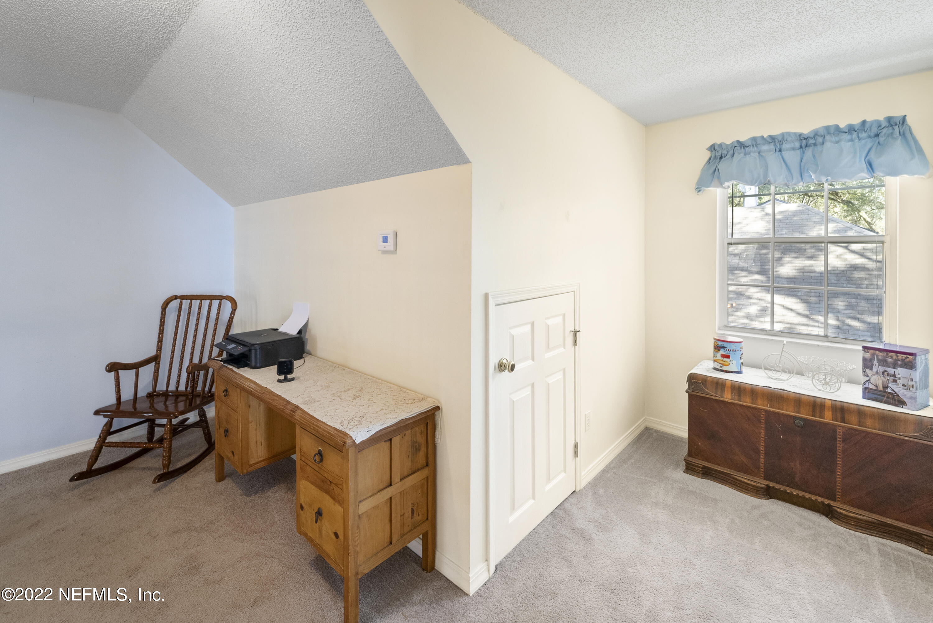 12855 Moose Road Jacksonville, FL 32226 - Photo 23 of 29 a room with furniture and a window