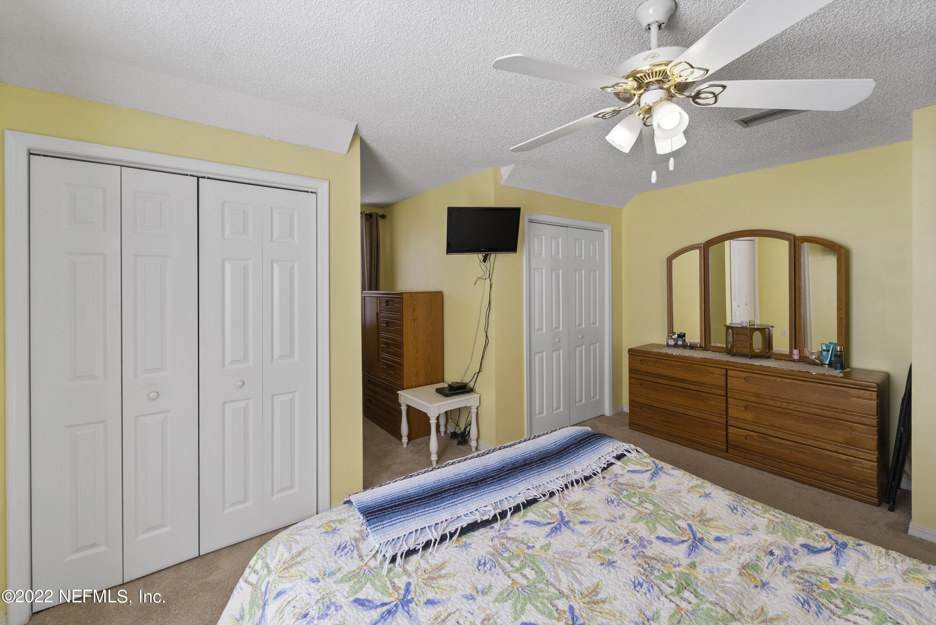 12855 Moose Road Jacksonville, FL 32226 - Photo 26 of 29 a bed room with a bed and a television