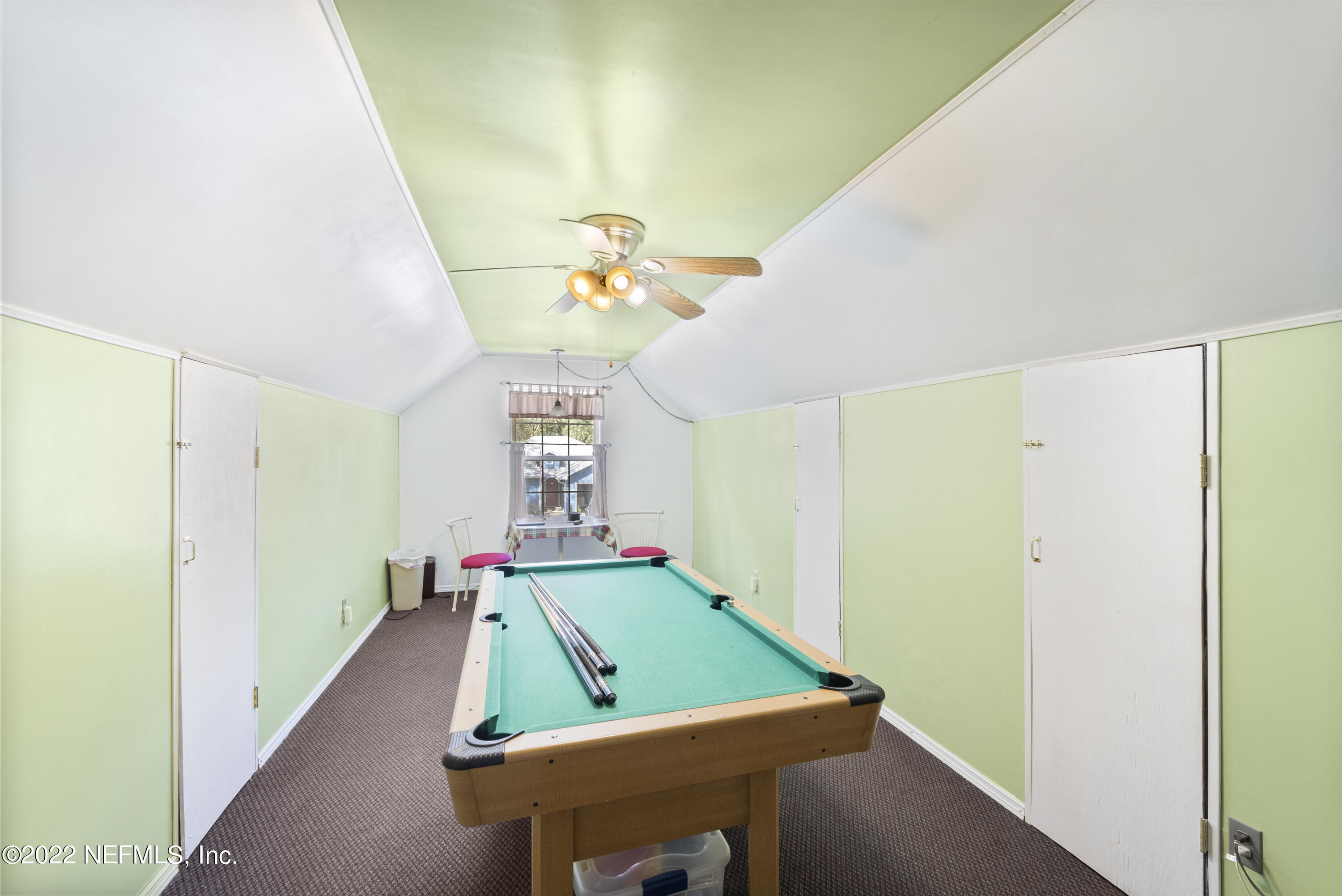 12855 Moose Road Jacksonville, FL 32226 - Photo 29 of 29 a room with pool table and windows