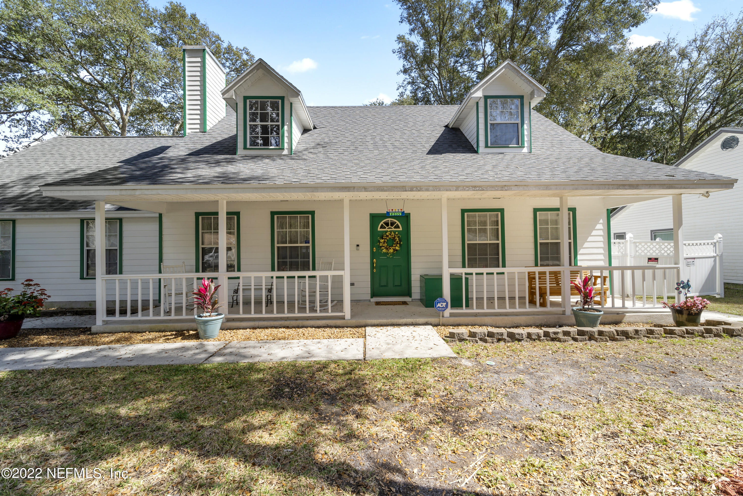 12855 Moose Road Jacksonville, FL 32226 - Photo 5 of 29 a front view of a house with a yard