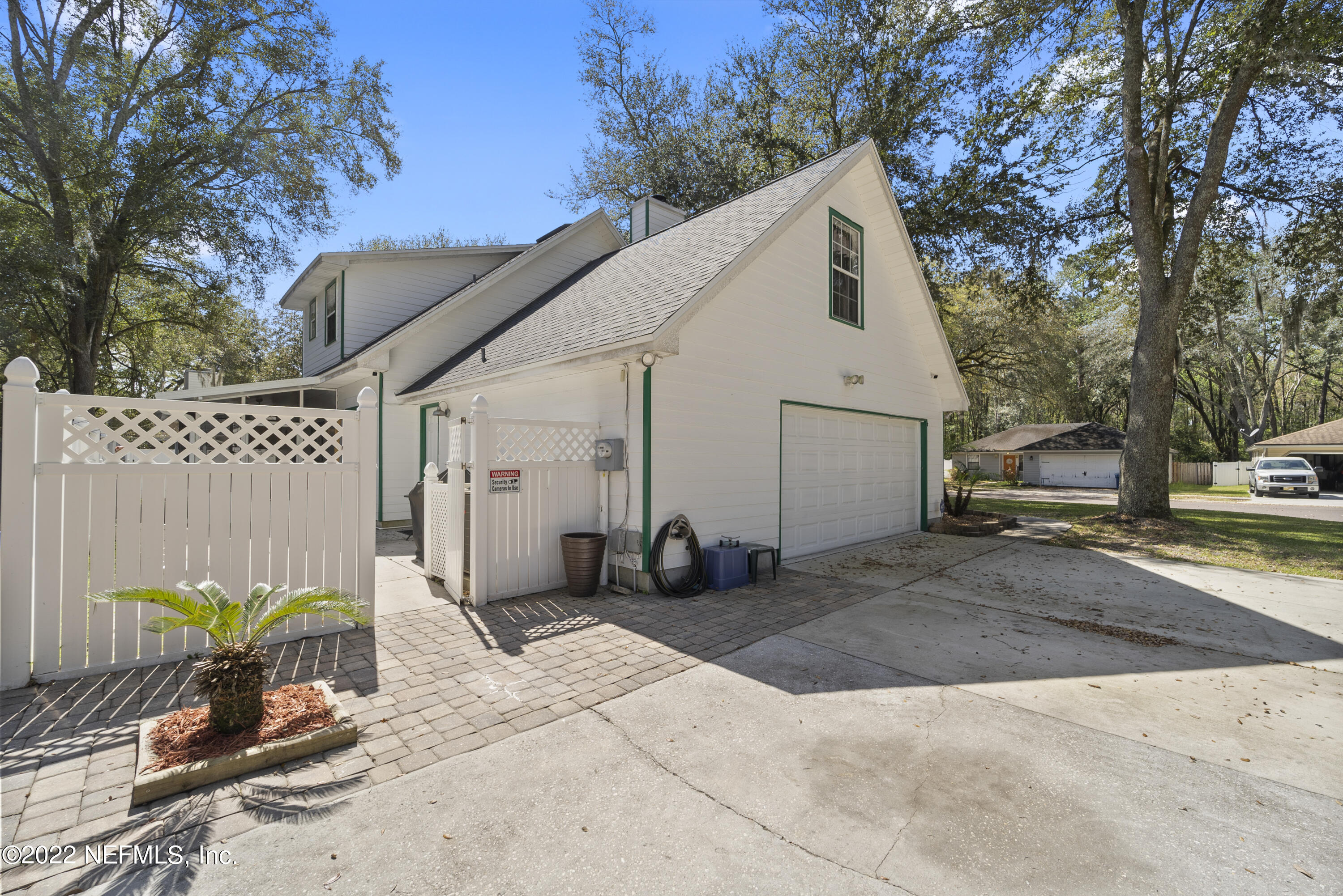 12855 Moose Road Jacksonville, FL 32226 - Photo 8 of 29 a view of a house with a patio