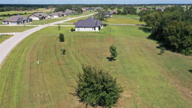 an aerial view of residential building and lake view