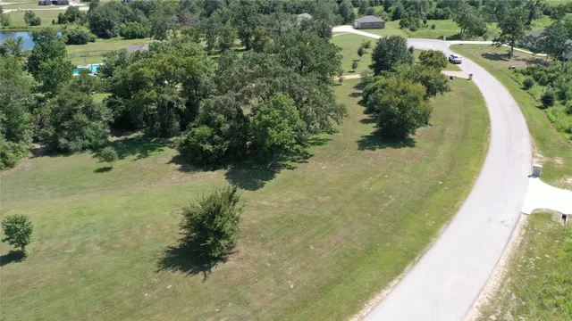 a view of a golf course with a trees