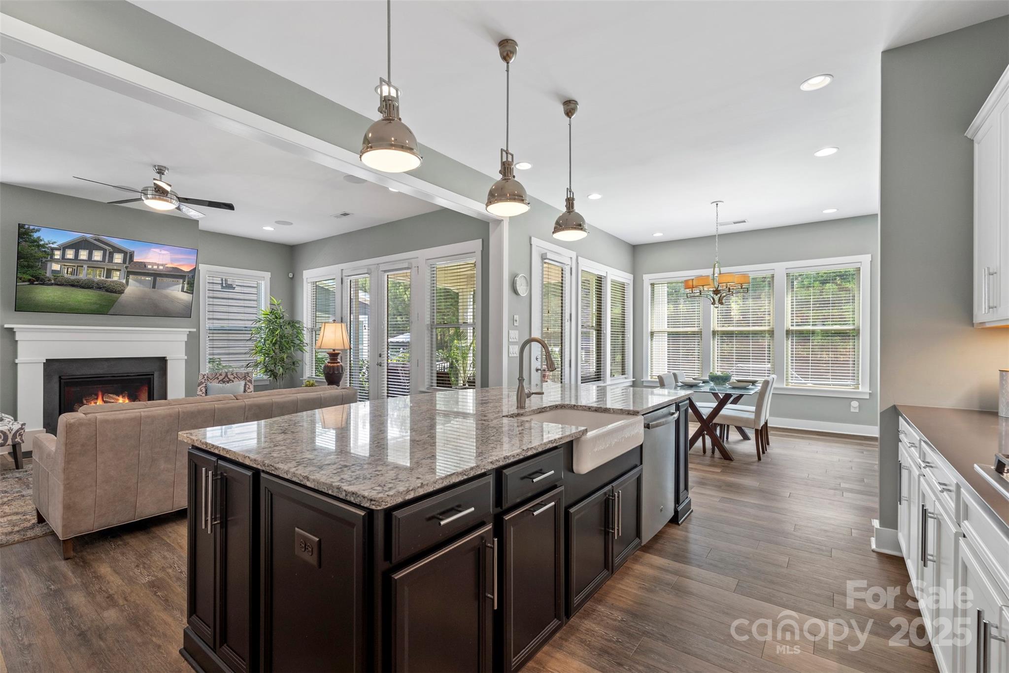2052 Masons Bend Drive Fort Mill, SC 29708 - Photo 15 of 41 a kitchen with granite countertop a stove a sink and a refrigerator