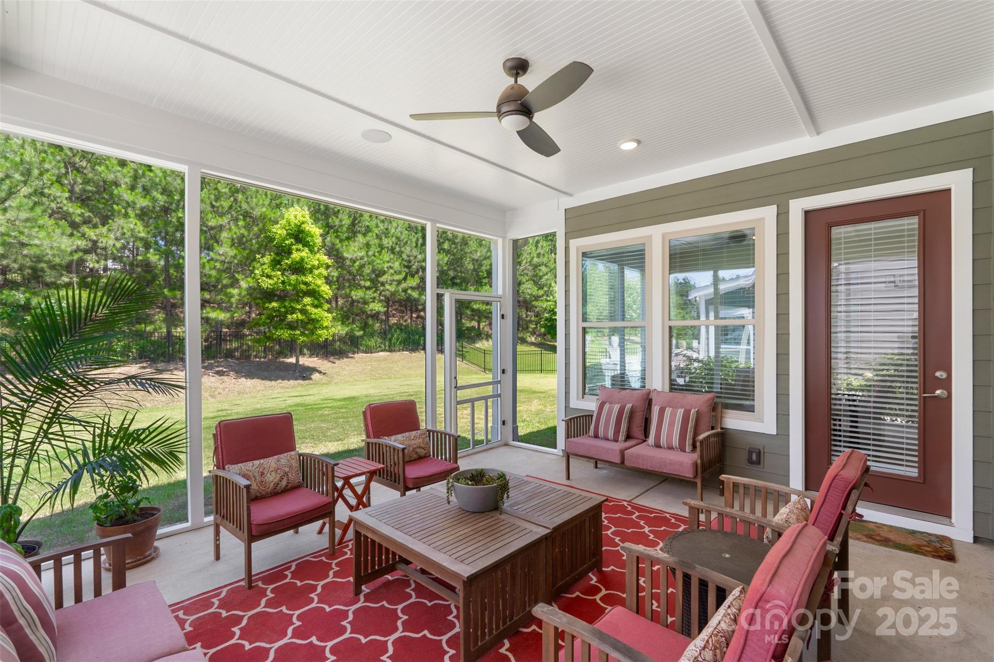 2052 Masons Bend Drive Fort Mill, SC 29708 - Photo 18 of 41 a living room with furniture and floor to ceiling windows