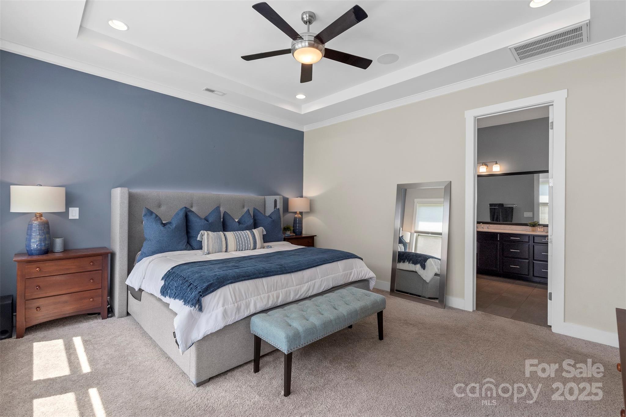 2052 Masons Bend Drive Fort Mill, SC 29708 - Photo 20 of 41 a spacious bedroom with a bed and a ceiling fan
