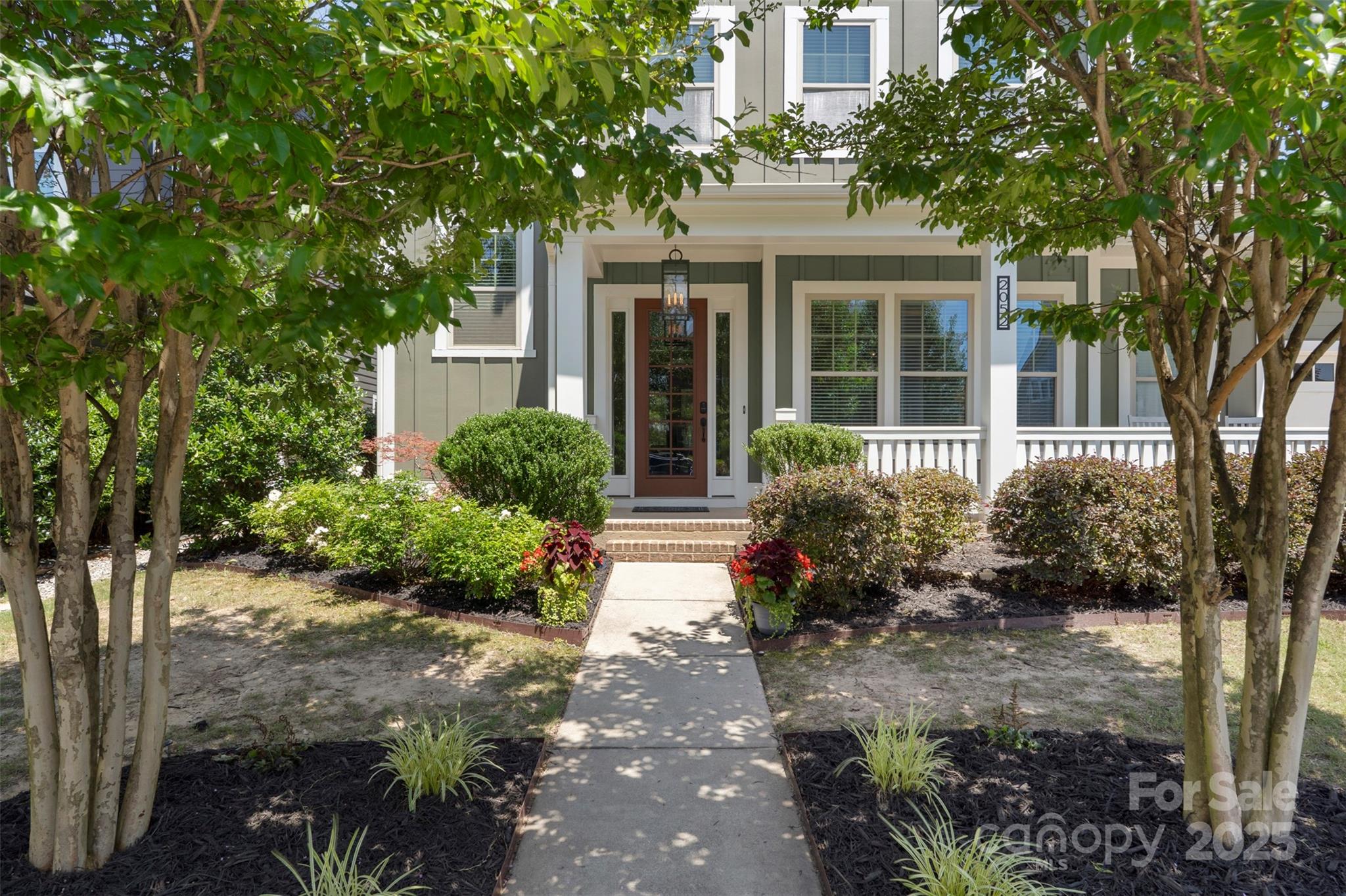 2052 Masons Bend Drive Fort Mill, SC 29708 - Photo 3 of 41 a front view of a house with garden