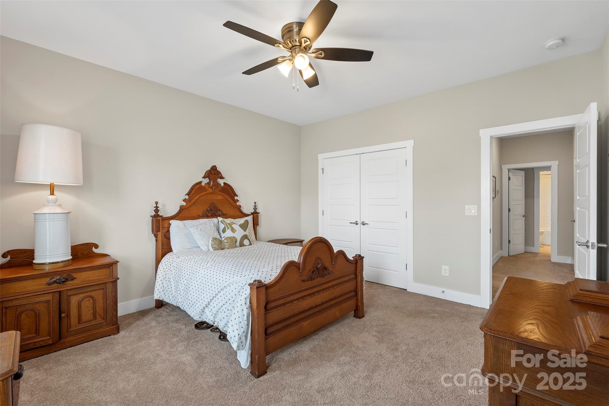 2052 Masons Bend Drive Fort Mill, SC 29708 - Photo 31 of 41 a bedroom with a bed and a lamp with the dresser