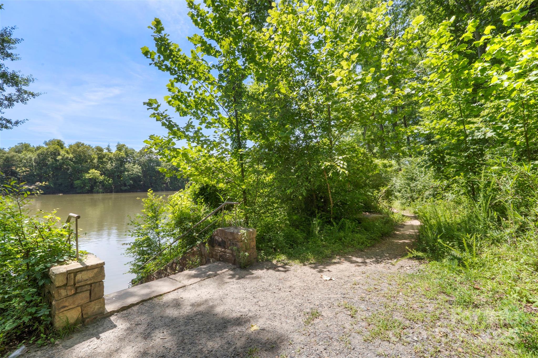 2052 Masons Bend Drive Fort Mill, SC 29708 - Photo 41 of 41 a backyard of a house with lots of green space and lake view