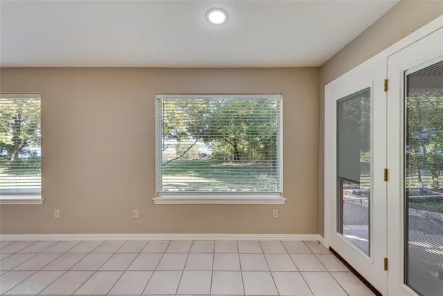 a kitchen with stainless steel appliances a sink stove and refrigerator