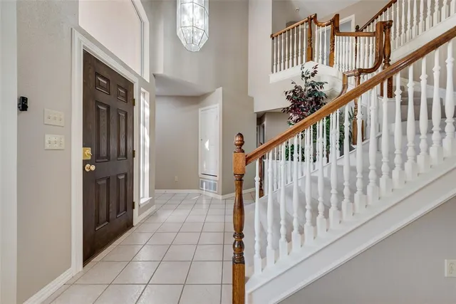 a view of entryway with flower pots