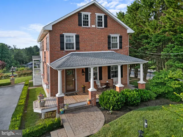 front view of house with a yard