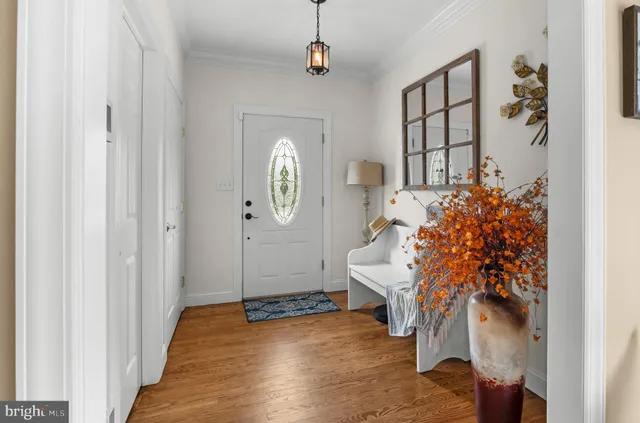 a bathroom with double vanity sinks and a mirror